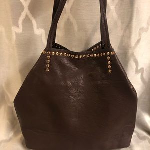 Brown studded shoulder bag.